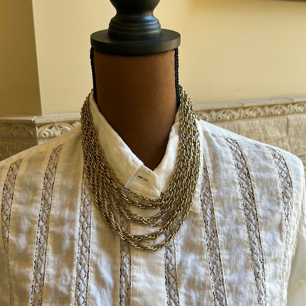 Kramer Vintage Gold toned 6 strand necklace with hook closure 18”